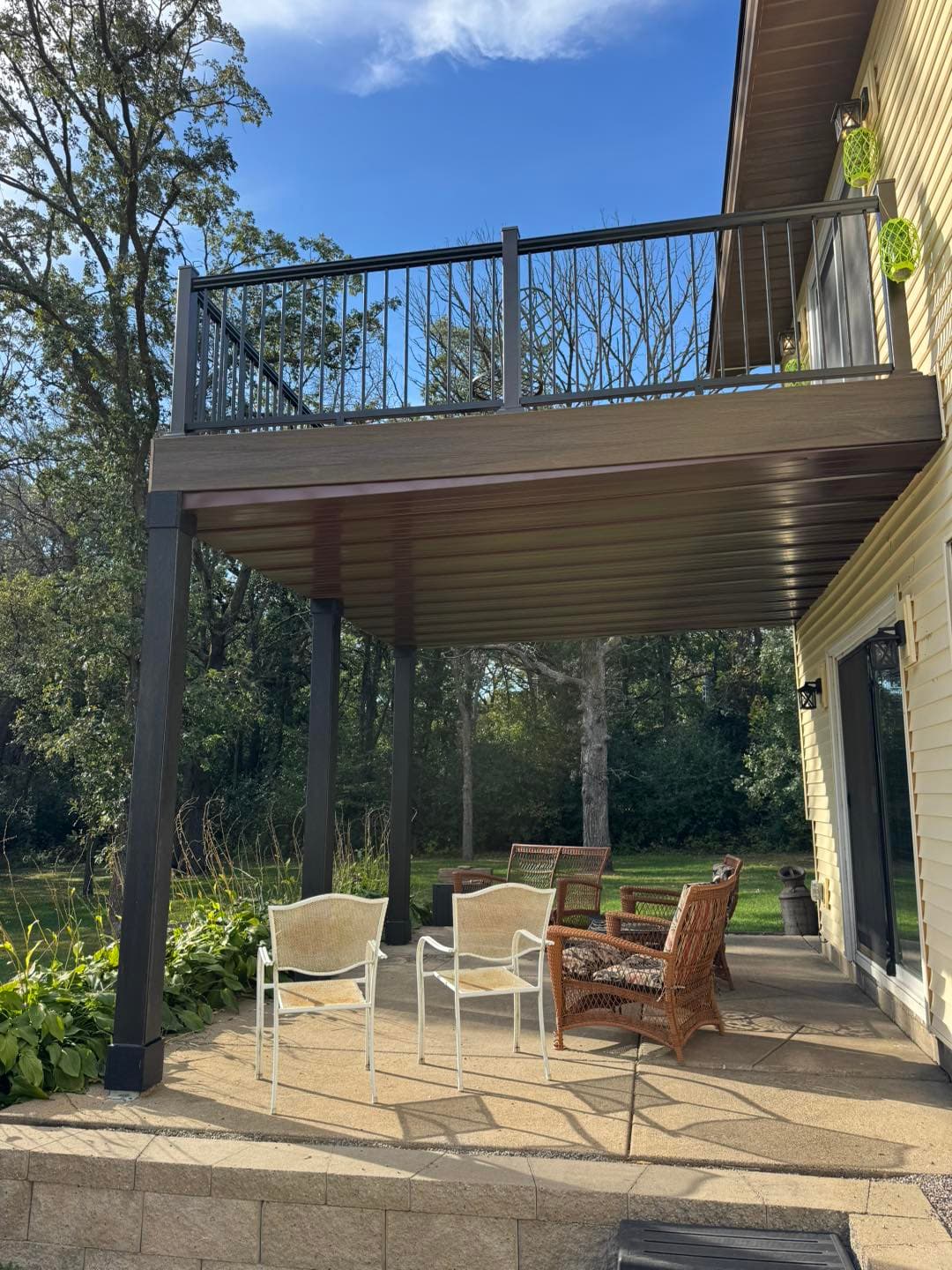 Under-deck covered patio with outdoor seating